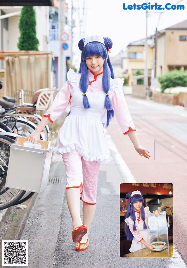 A woman in a pink and white outfit is walking down the street.