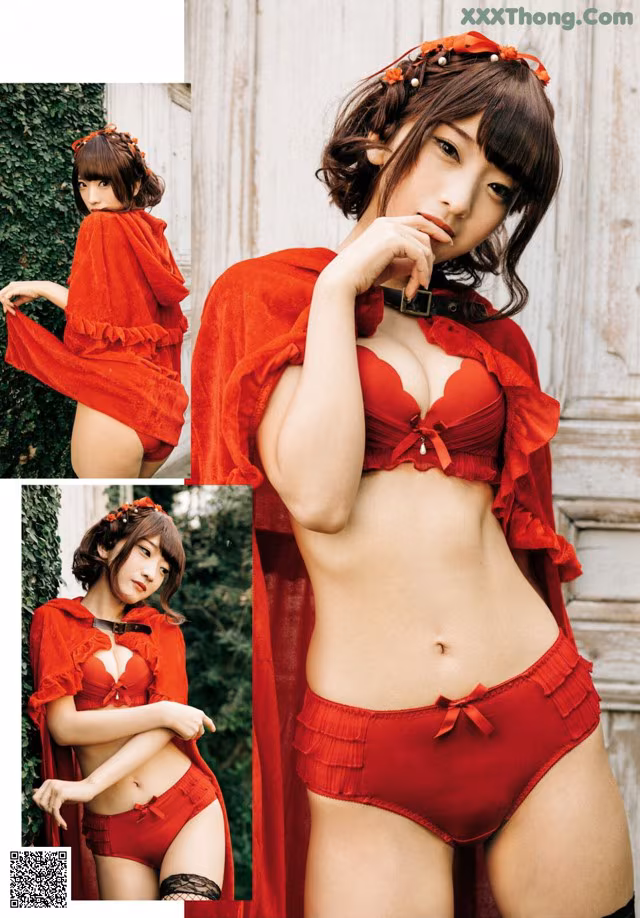A woman in a red lingerie posing for a picture.
