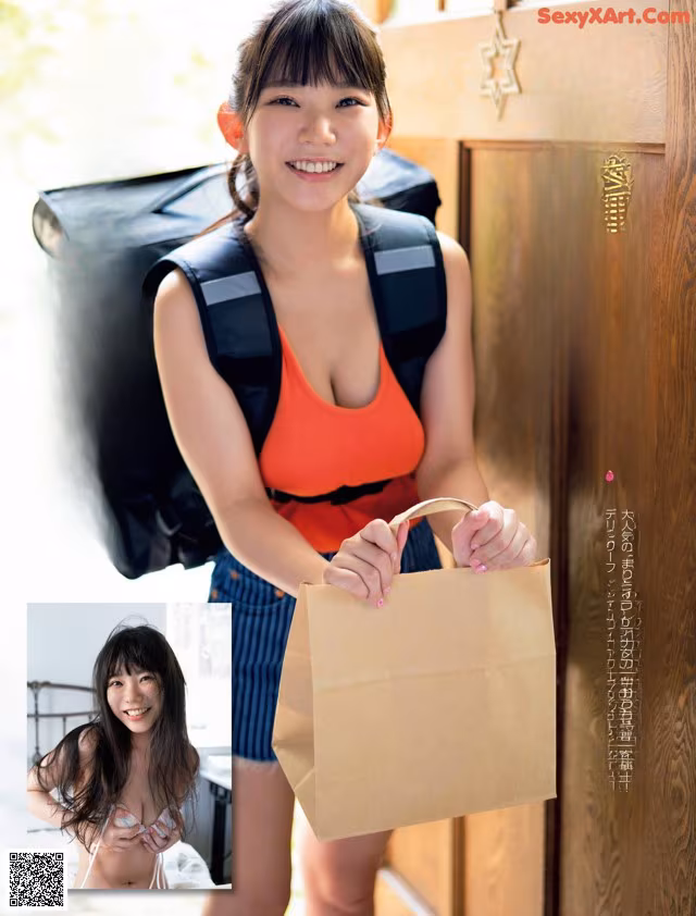 A woman holding a brown paper bag in front of a door.