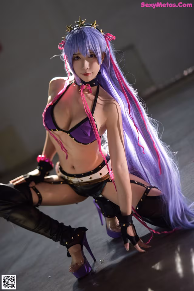 A woman with long purple hair and a crown on her head.